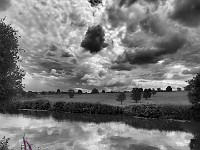 Purple Loosestrife  Nearly the last image I added to the collection for the exhibition. Hearing the weather man on the radio say, on the previous evening, that there could be some “pretty impressive skies” next day caught my attention. He wasn’t wrong. The little black cloud stayed resolutely in the wrong place to reflect properly in the river, before it just faded away. £190